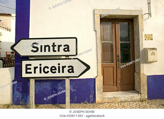 Street sign points to Sintra and Ericeira, Portugal