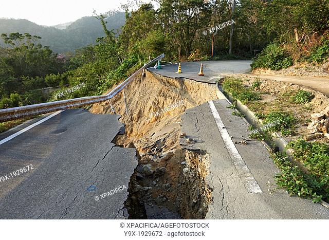 Landslide damage caused by typhoons and torrential rains on a mountain road in Okinawa