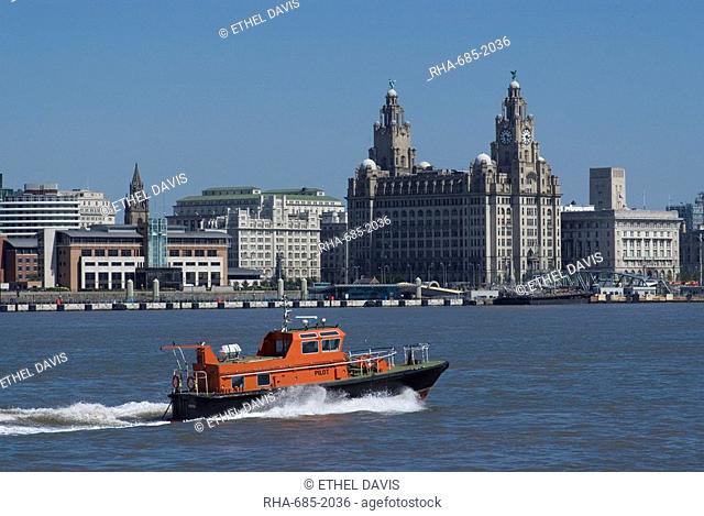 View of the Liverpool skyline and the Liver building, with a pilot boat in the foreground, taken from the Mersey ferry, Liverpool, Merseyside, England