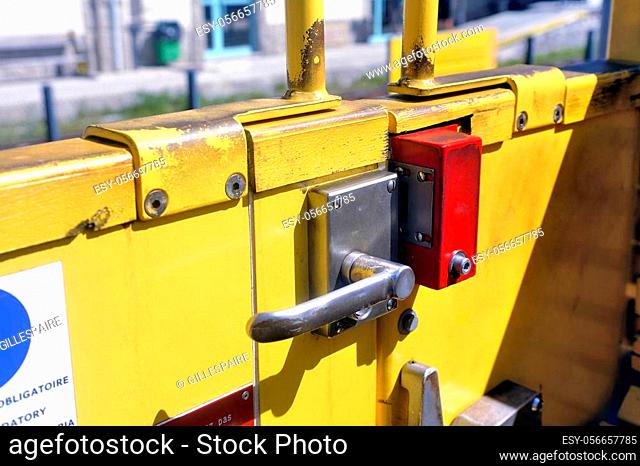 Door opening system of the little yellow train in close-up