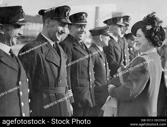 Passed by Censor - Royal Tour of West Country.Laughing Queen inspecting officers of the mercantile marine during their Majesties tour of the west country today...