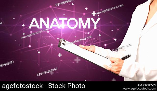 Doctor fills out medical record with ANATOMY inscription, medical concept