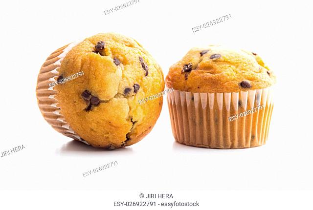 The tasty chocolate muffin isolated on white background