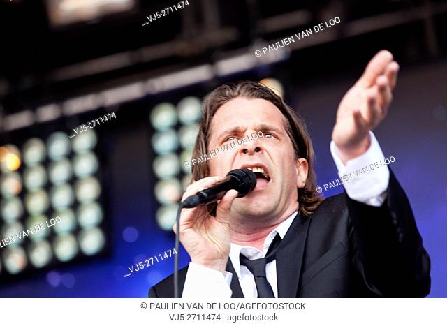 Roermond, Netherlands, Hans Teeuwen is performing and singing at Solar event
