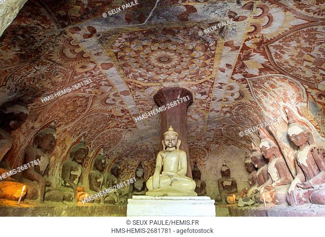 Myanmar (Burma), Sagaing region, Monywa, Hpo Win Daung, cave number 307, white marble Buddha and sixteen Buddhas statues carved in the rock