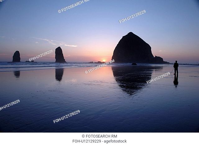 Cannon Beach, OR, Oregon, Pacific Ocean, Pacific Coast Scenic Byway, Rt Route, Highway 101, Cannon Beach, Haystack Rock, reflection, sunset