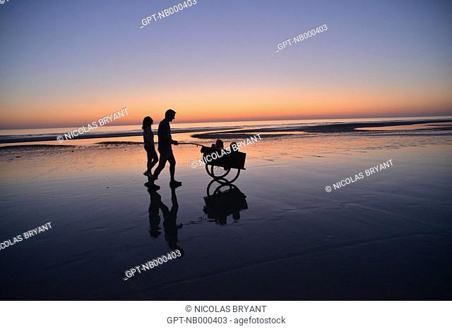 FAMILY HAVING A STROLL IN CAYEUX-SUR-MER, SOMME, PICARDY