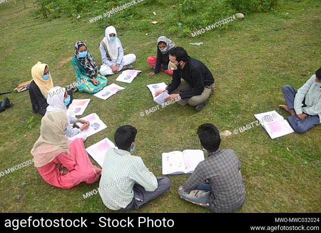Students attending their open air classes at Doodhpathri in Budgam district, Kashmir, India