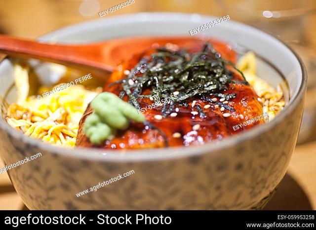 traditional Japanese ramen noodles with unagi eel on top