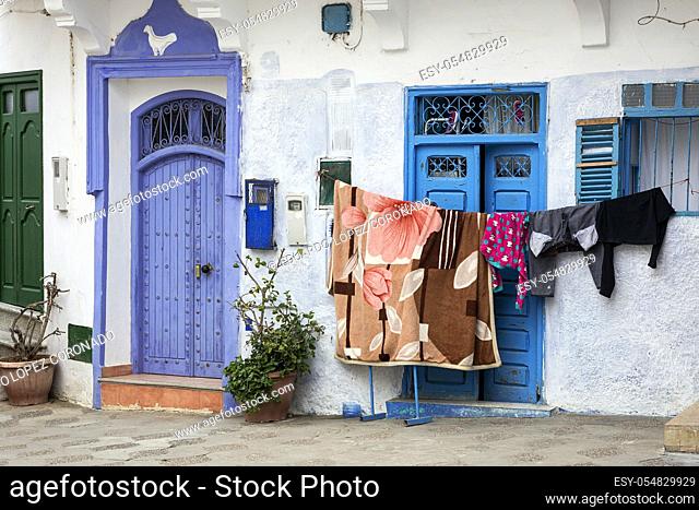 Typical arabic architecture in Asilah. Streets, doors, windows, shops. Morocco