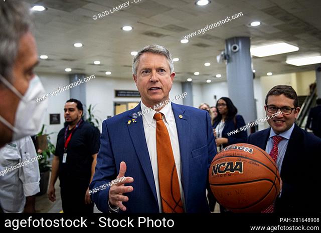 United States Senator Roger Marshall (Republican of Kansas) shows off to reporters a NCAA basketball which he had signed by Senators from North Carolina