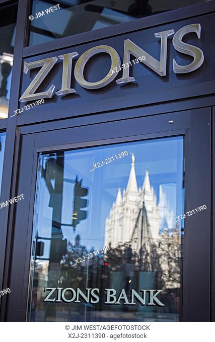 Salt Lake City, Utah - Zions Bank with the Salt Lake Temple of the Church of Jesus Christ of Latter Day Saints (Mormons) reflected in the glass door