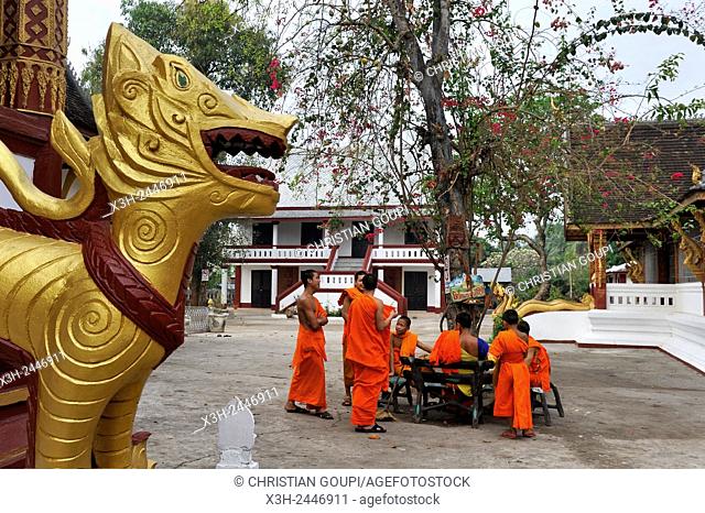 novice monks at Vat Manorom monastery, Luang Prabang, Laos, Southeast Asia