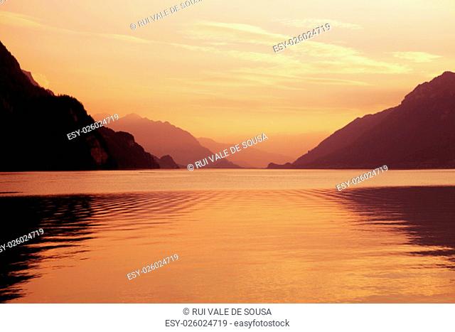 swiss lake at sunset in brienz, switzerland