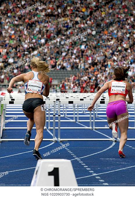 The Germans Nadine Hildebrand and Lilly Schwarzkopf immediately after the start of the 100 meter hurdles at the ISTAF 2012 at the Olympic Stadium in Berlin