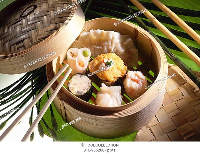Assorted dim sum in a steaming basket
