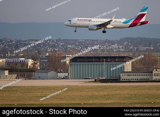 18 March 2020, Baden-Wuerttemberg, Stuttgart: Passengers on a return flight from Hurghada (Egypt) arrive at the airport with a Eurowings Type 32A aircraft