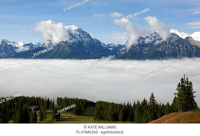 Rocky Mountains above the clouds, Lake Louise, Alberta