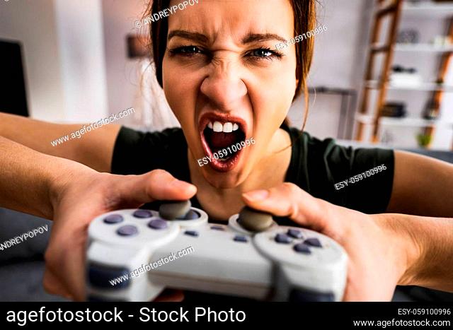 Female Gaming Addiction. Player With Console Controller