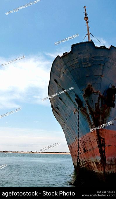 Partial view of an old and rusty ship