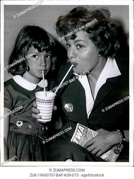 Jul. 07, 1960 - Academy Award Winner Shelley Winters shares a straw with daughter Vittoria, 7, as they try to beat the New york heat prior to Boarding a T