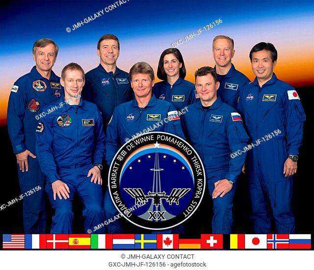 Expedition 20 crew members take a break from training at NASA's Johnson Space Center to pose for a crew portrait. From the left (front row) are European Space...