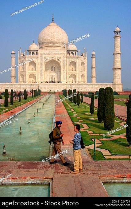 People standing at Taj Mahal complex in Agra, Uttar Pradesh, India. It was build in 1632 by Emperor Shah Jahan as a memorial for his second wife Mumtaz Mahal