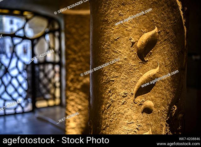Shapes of leaves sculpted on a stone column on the access staircase to the noble floor of La Pedrera - Casa Milá  (Barcelona, Catalonia, Spain)
