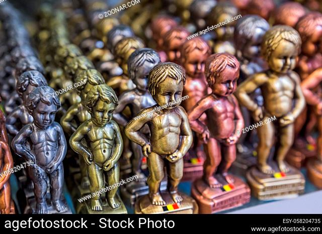 Pissing Boy (Manneken Pis) toys in souvenir shop - symbol of Brussels Belgium