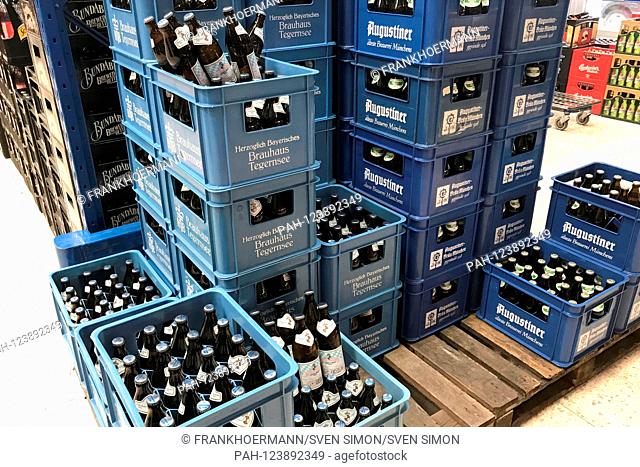 Stacked full beer crates in a beverage market, Brauhaus Tegernsee, Augustiner, | usage worldwide. - Munich/Bayern/Deutschland