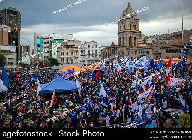 29 March 2021, Bolivia, La Paz: Supporters attend the 26th anniversary of the founding of the ruling party MAS (Movimiento al Socialismo - Movement for...