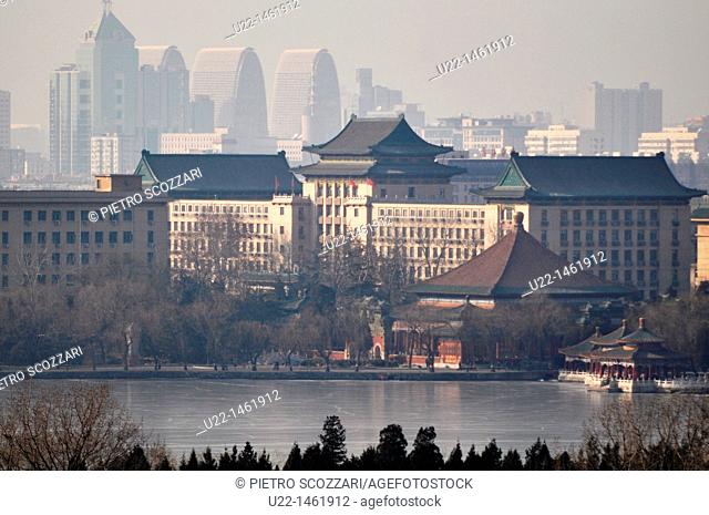 Beijing (China): view of the capital and on Beihai Park’s lake from the temple on the hill that dominates Jingshan Park
