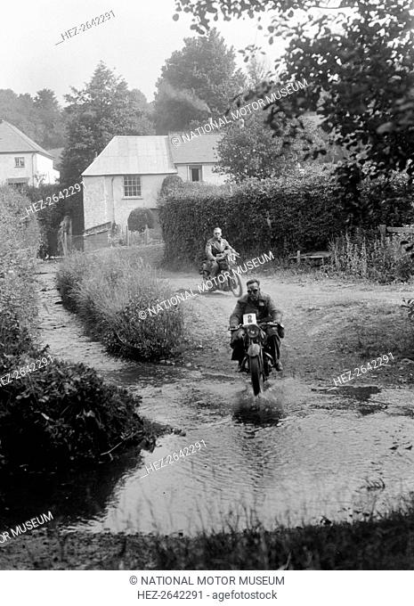 Motorcycles competing in the B&HMC Brighton-Beer Trial, Windout Lane, near Dunsford, Devon, 1934. Artist: Bill Brunell