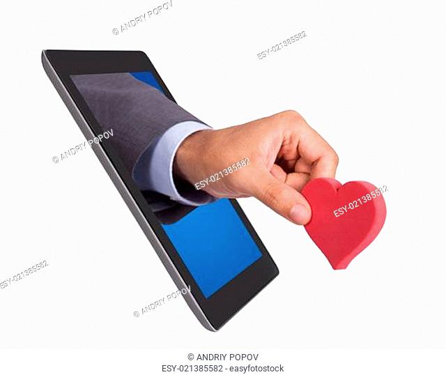 Hand Holding Heart Shape Coming From Tablet