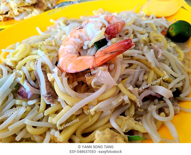 Hokkien Mee Stir Fry Noodles with Calamari Prawns Squid and Pork Closeup