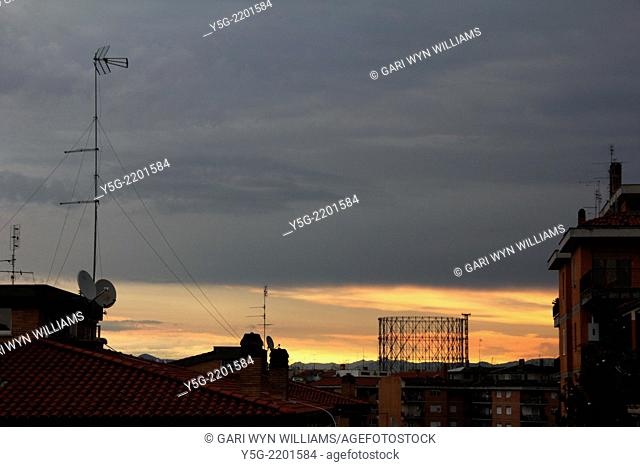 Rome, Italy 16th June 2014 Weather Italy - Storm clouds at sunrise gather above the gas holder in the Testaccio district of Rome