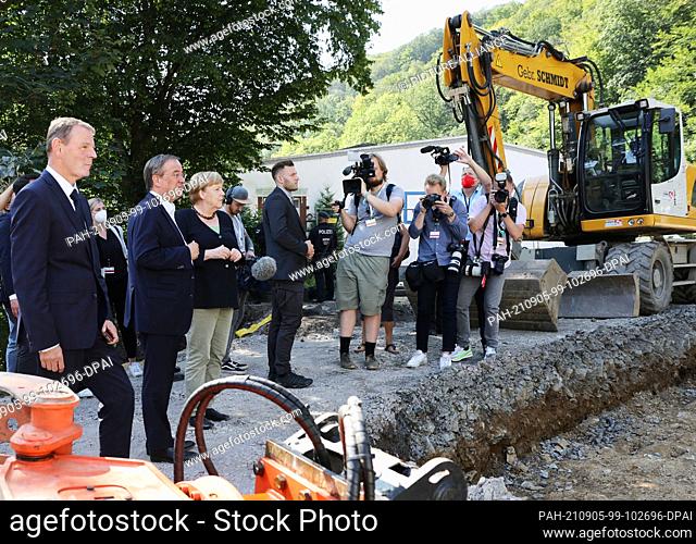 05 September 2021, North Rhine-Westphalia, Hagen: Federal Chancellor Angela Merkel (3rd from left) and Armin Laschet (2nd from left)