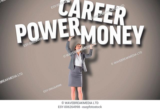 Businesswoman pushing up with hands against grey background with text
