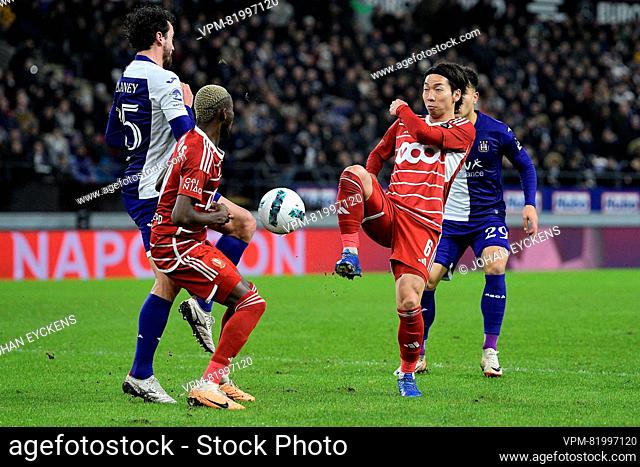 Anderlecht's Thomas Delaney and Standard's Hayao Kawabe fight for the ball during a soccer match between RSC Anderlecht and Standard de Liege