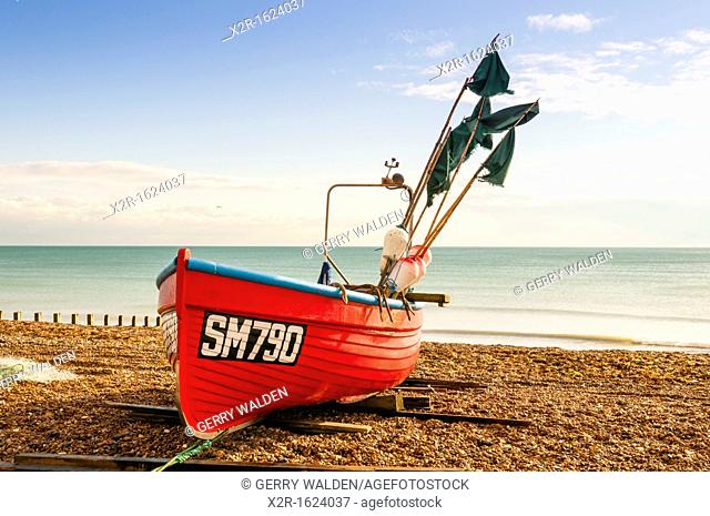 Small fishing vessel beached at Worthing in West Sussex, England