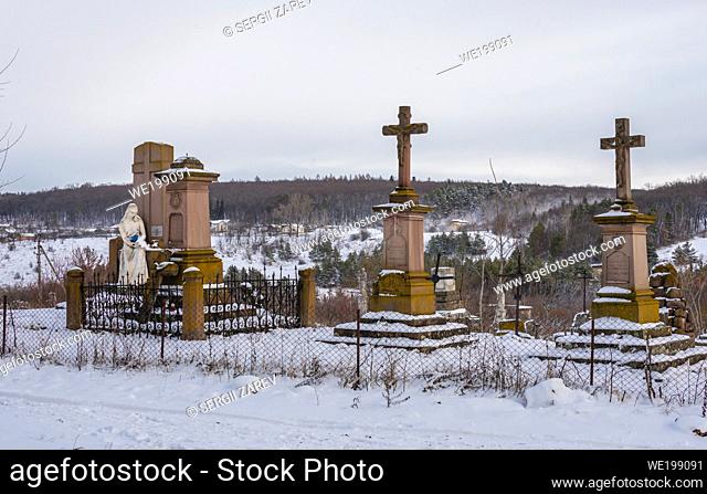 Mykulyntsi, Ukraine 01. 06. 2020. Grave of the Reyiv family and the Polish cemetery in Mykulyntsi village, Ternopil region of Ukraine, on a winter day