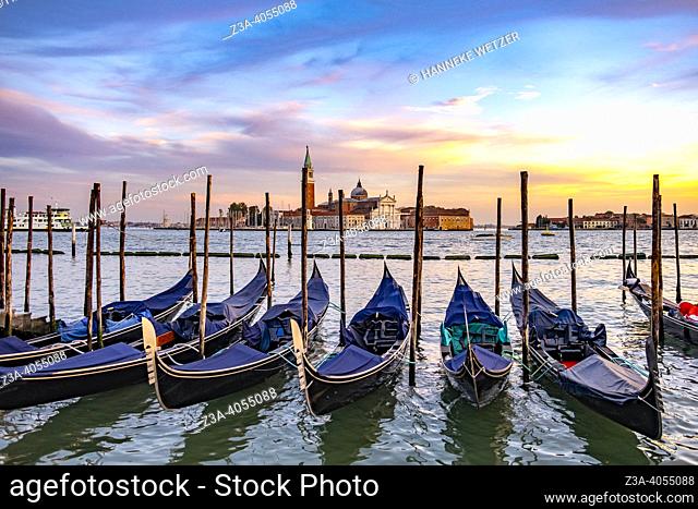 Gondolas at sunset in romantic Venice, Italy, Europe