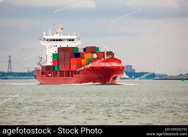 Industrial ship headig out of the port