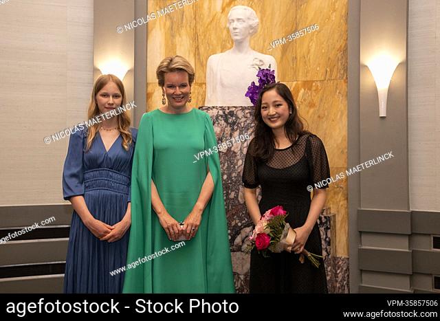 Princess Eleonore, Queen Mathilde of Belgium and winner Hayoung Choi meet after the final session of the Queen Elisabeth Cello Competition 2022