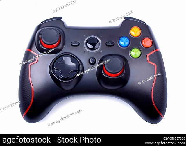 Black game controller isolated on a white background