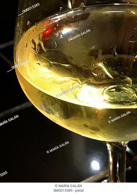 Glass of white wine. Close view