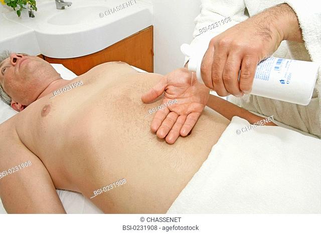 ELDERLY PERSON BEING MASSAGED Model. Center of thalassotherapy Alkantara Thalassa in Djerba Tunisia. The masseur uses oil massage