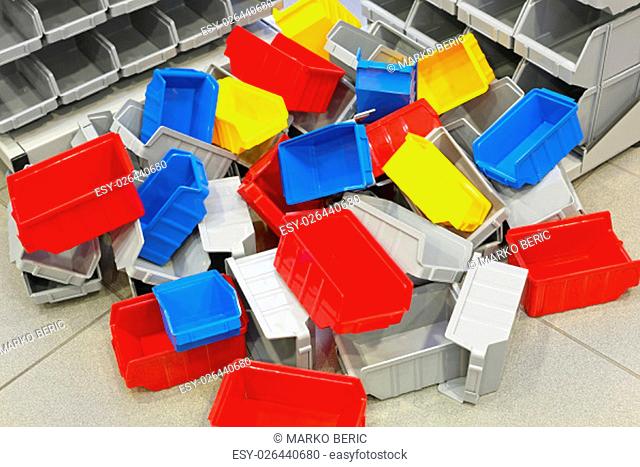Big Bunch of Colorful Plastic Bins and Tubs