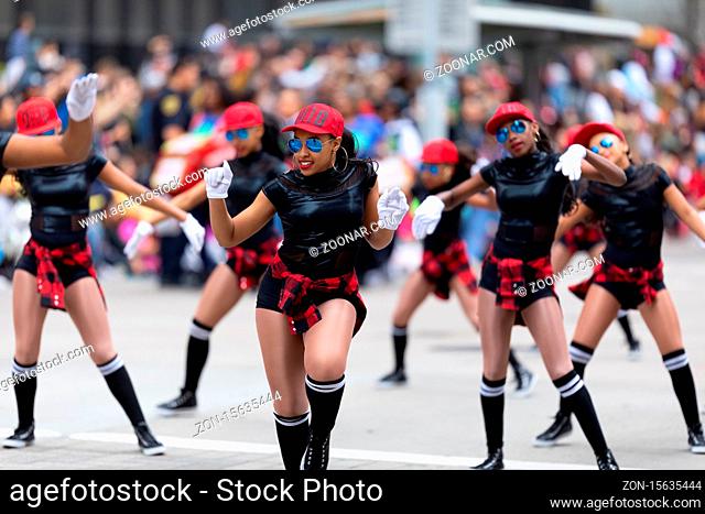 Houston, Texas, USA - November 28, 2019: H-E-B Thanksgiving Day Parade, Members of the Designed 2 Dance Performing Arts, dancing at Milam Street during the...
