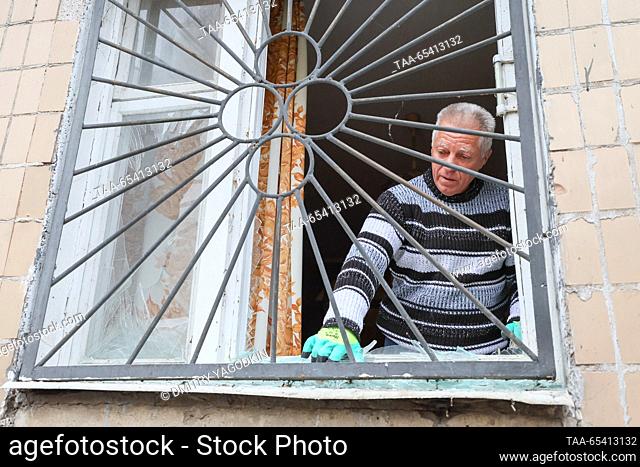 RUSSIA, DONETSK - DECEMBER 2, 2023: A man is seen in an apartment block damaged in a shelling of the Kirovsky neighbourhood by the Ukrainian Armed Forces